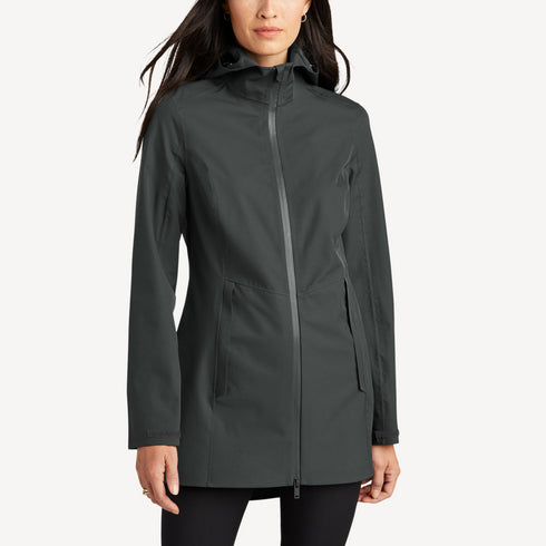 Front view of women’s gray long waterproof rain shell on model – Louvóre apparel